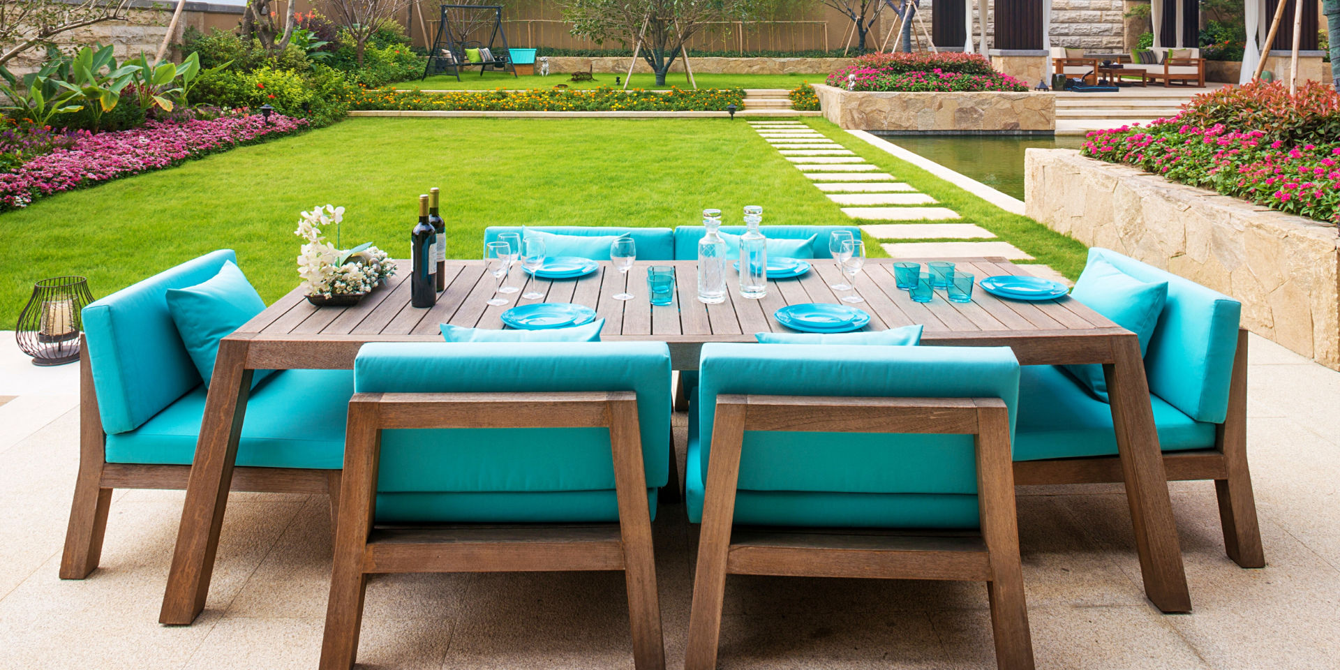 New turqoise garden furniture cushions by Frey Casa are custom made to compliment your garden style. Perfect for family time.