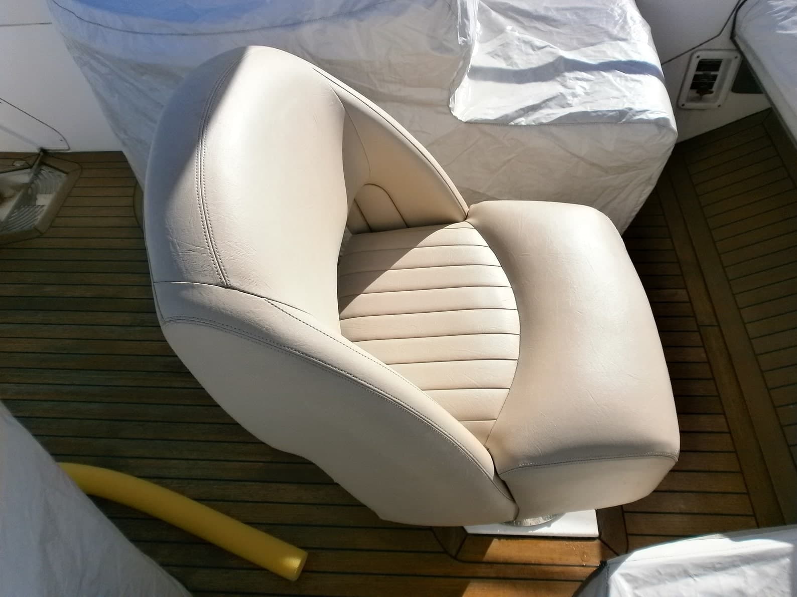 Sealine T-60 helm seats before, needing a Frey re-vamp in durable, water-repellent fabric.