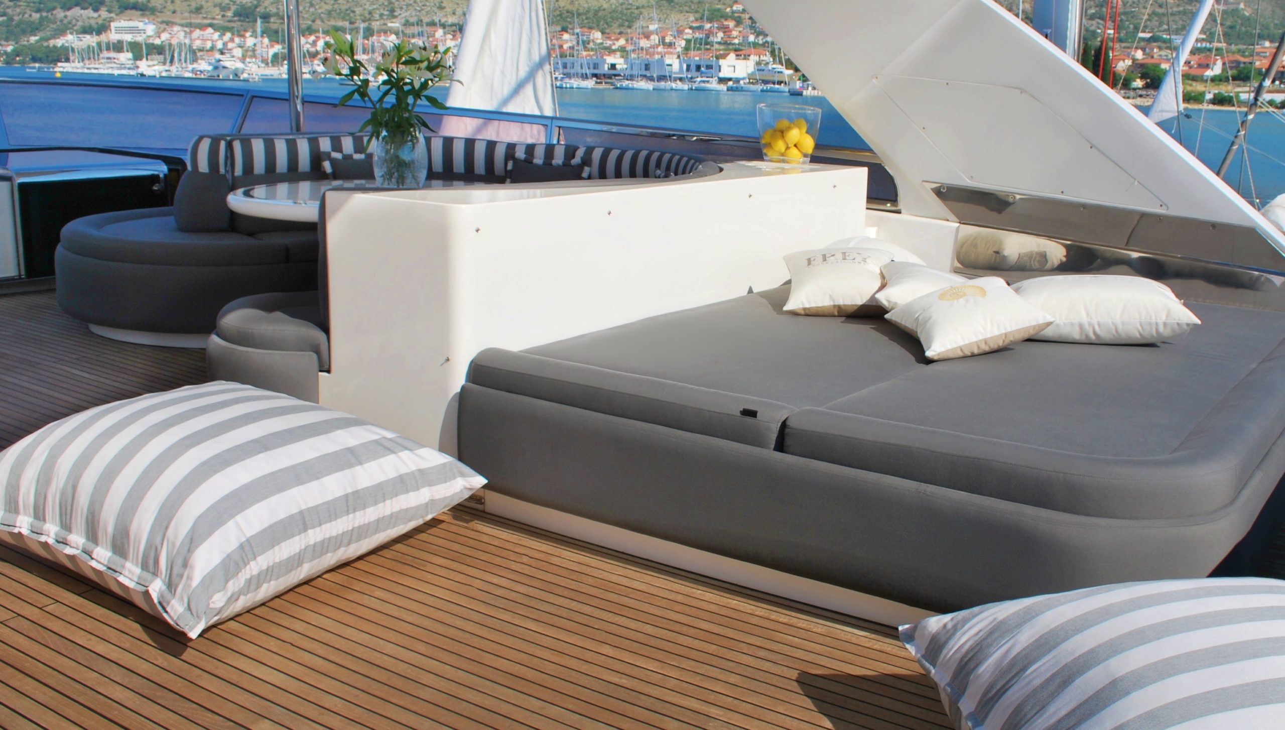 Newly reupholstered sun lounge & flybridge sunbed with Frey Luxury Pillows for complete new exterior for Elegance 78ft yacht.