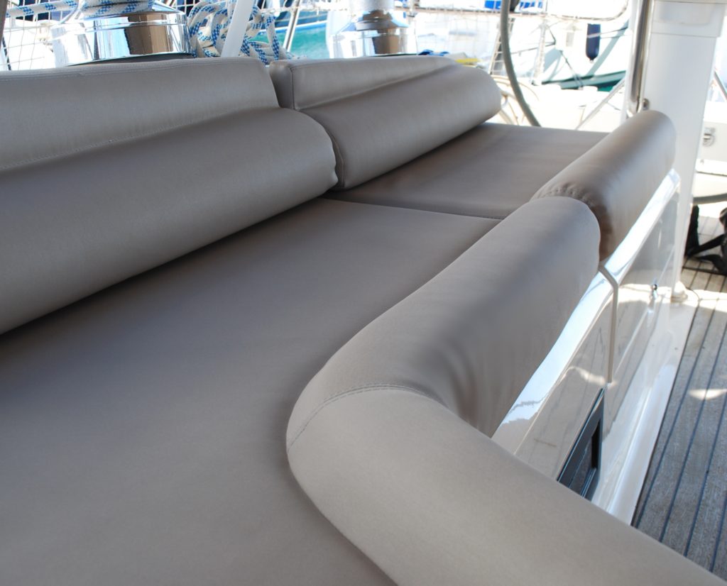 Bavaria 55 Cruiser newly reupholstered cushions by Frey, with comfortable back rests in durable sand & stone Spradling vinyl.