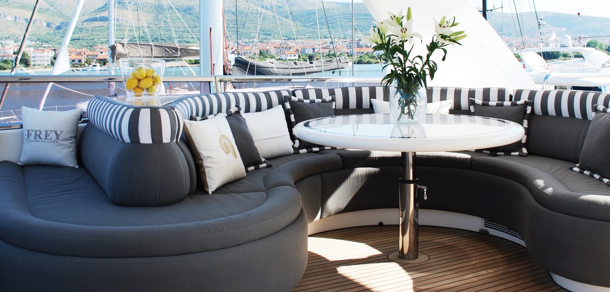 Complete new customised grey cushions with white stripes & soft Frey Luxury Pillows for exterior of Elegance 78 FT yacht.