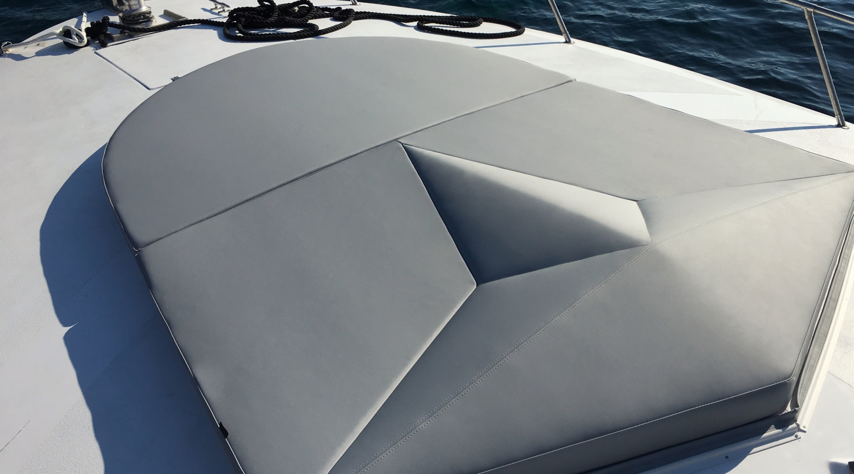 Innovative 'compass rose' design for yacht sunbed cushion. Offering maximum comfort, dryness and protection on your yacht.