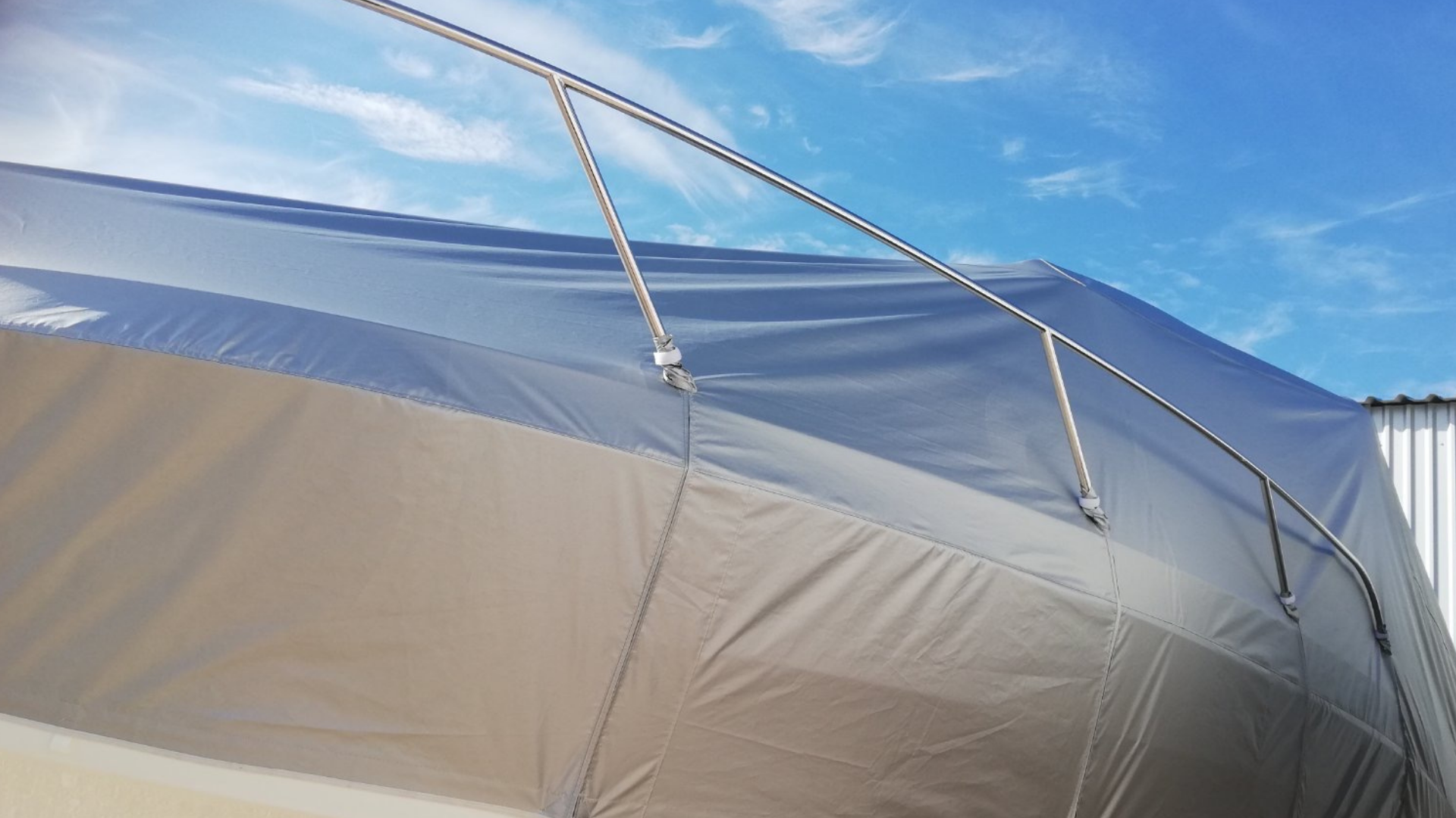 Solid winter protection for your complete yacht with strong and durable Frey winter awnings in adaptable silver grey colour.