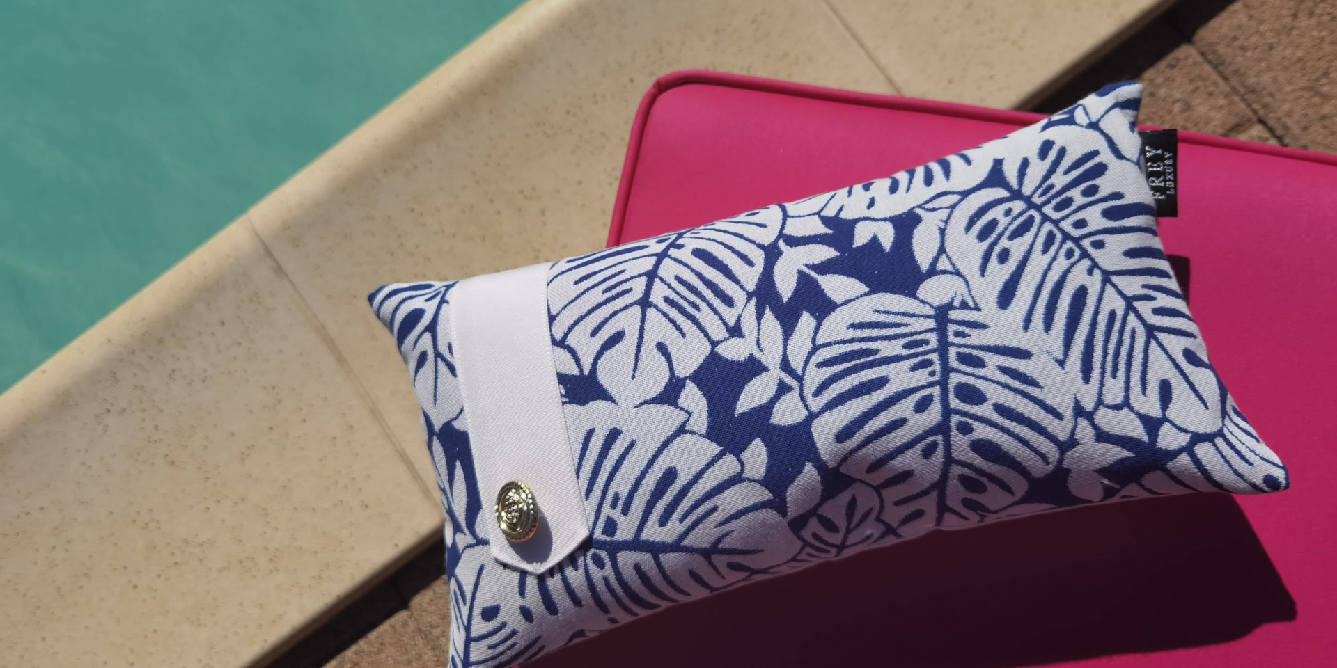 Stylize with Frey Luxury Pillows with button detail. Ideal decor for magenta poolside loungers.