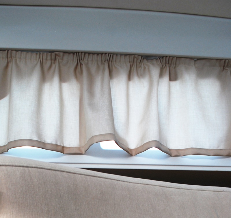 Yacht side window bespoke curtains by Frey are UV & water resistant, fadeproof, fire retardant, sound absorbent & washable.
