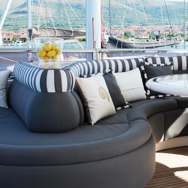 Horizon yacht Elegance 78ft complete exterior reupholstery, modernised into a stylish and contemporary look in grey with complimenting white stripes.
