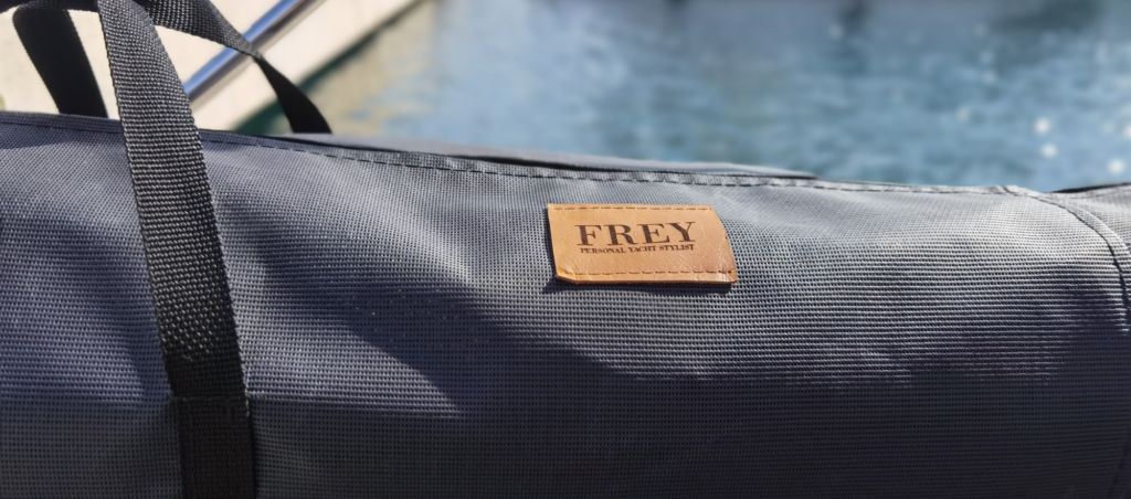 Dark grey Frey Smart Storage bag with strong black straps. The perfect way to protect your cockpit sunshades and save space.