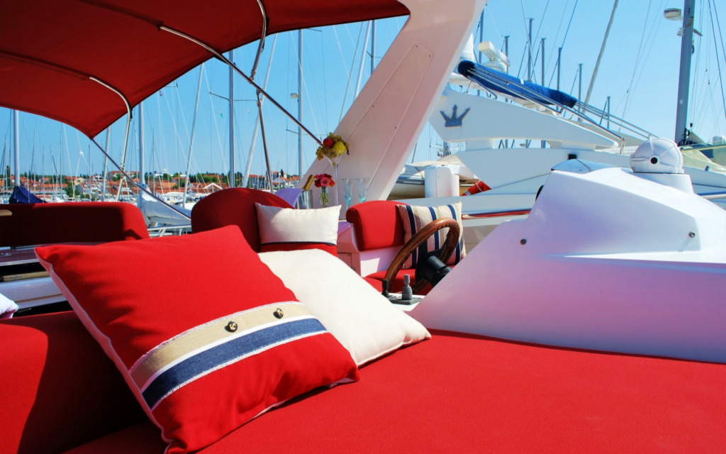 Red sunbed cushions add class & elegance with stylised Frey yacht decor luxury pillows for an attractive look on your yacht.