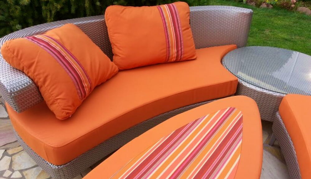 Rich orange & stripe fabric cushions & pillows are easy to clean & wear-resistant. Chosen as a reminder of Croatian sunsets.