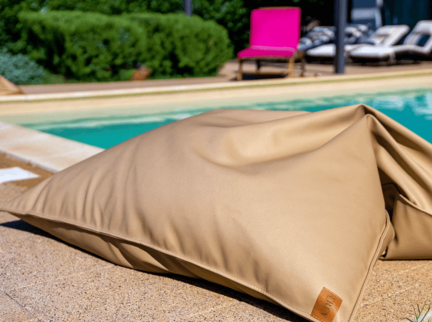 Portable indoor-outdoor bean bags by Frey, for extra poolside comfort at Villa Lu-Ma. In two tone beige & mushroom colour.