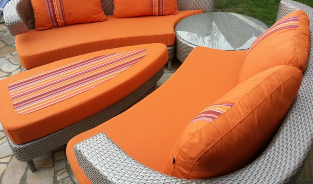 Bespoke garden furniture cushions in dryfast contour foam & made from durable, orange Sunbrella UV fabric. Perfect for pets.