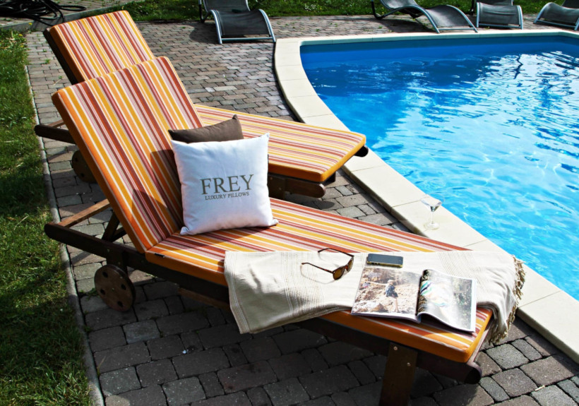 Bright vacation with comfy, soft, water-repellent poolside deck chair cushions with dryfast sponge. Frey Luxury Pillow decor.