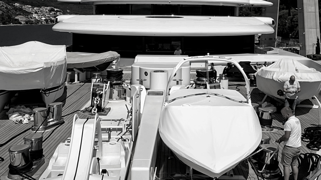 Team Frey install easy to use white premium protection awning over Nautique tender on deck of Kusch megayacht Al Mirqab 133m.