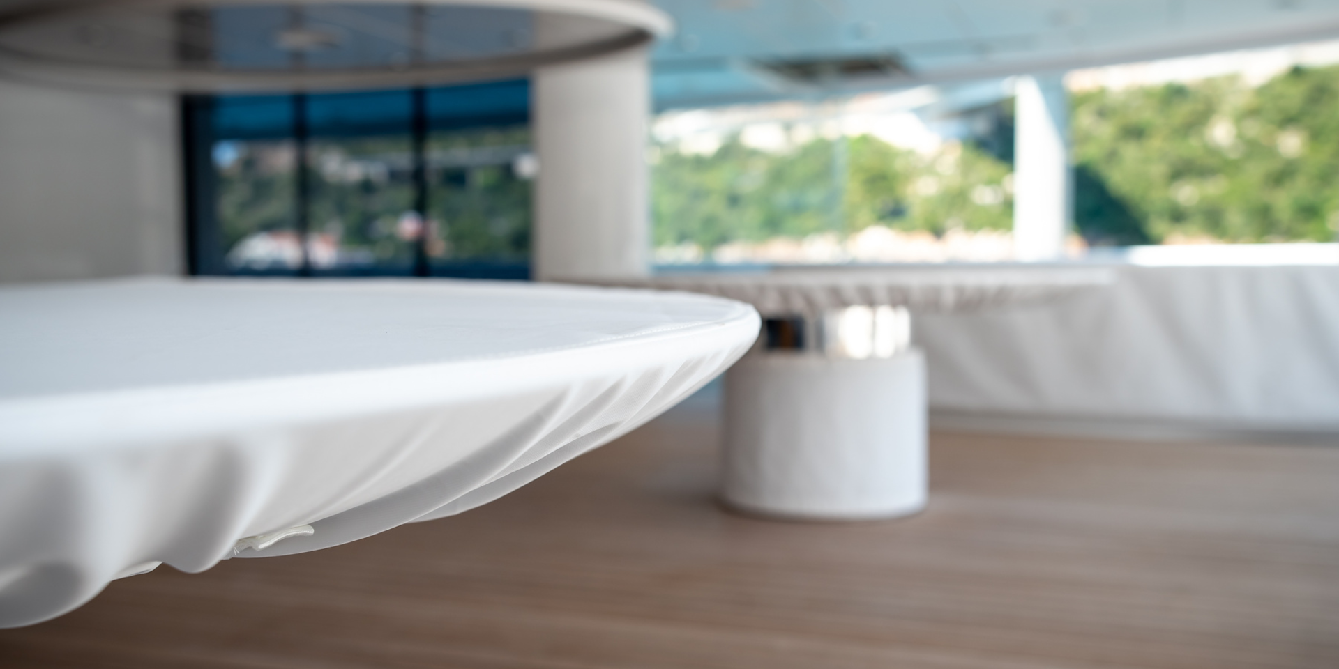Keeping superyacht deck furniture safe from sun, rain and wind with durable water-repellant, easy to clean protective covers.