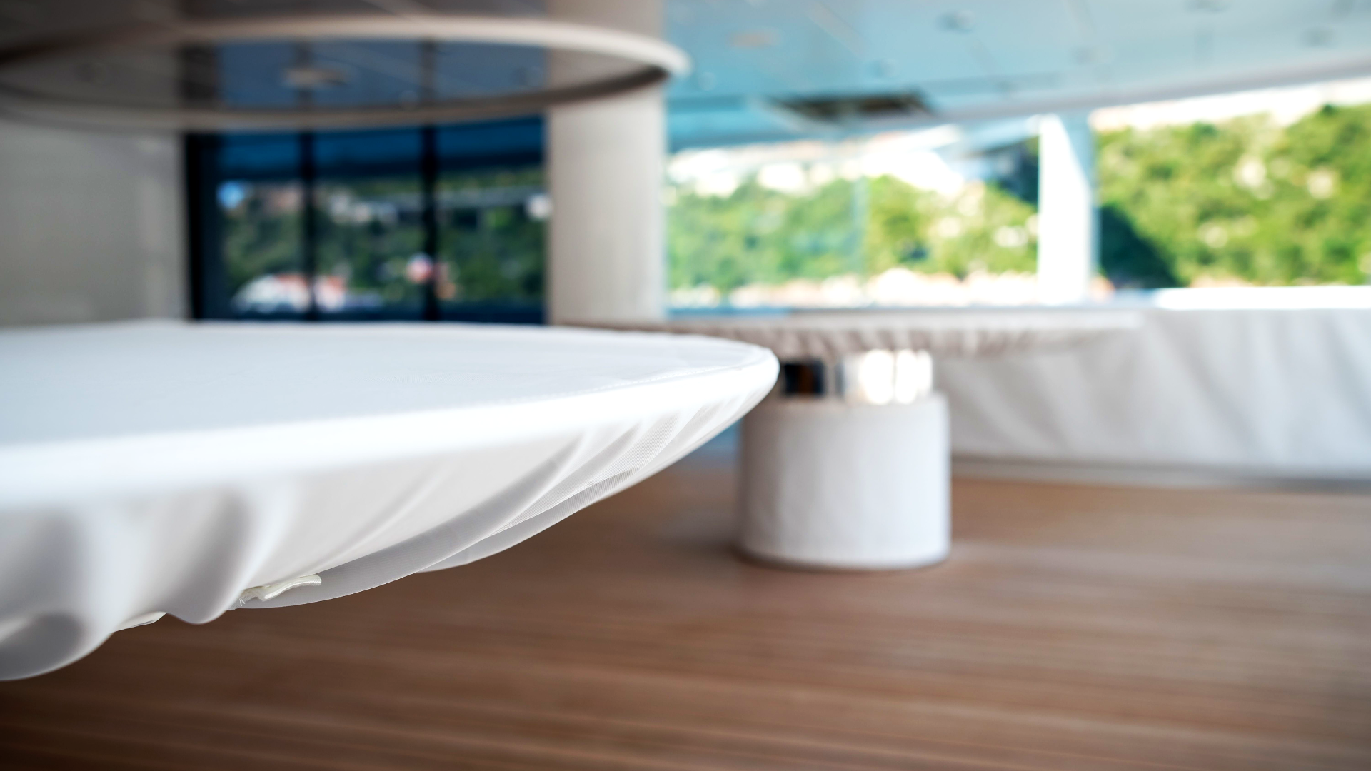 Keeping superyacht deck furniture safe from sun, rain and wind with durable water-repellant, easy to clean protective covers.